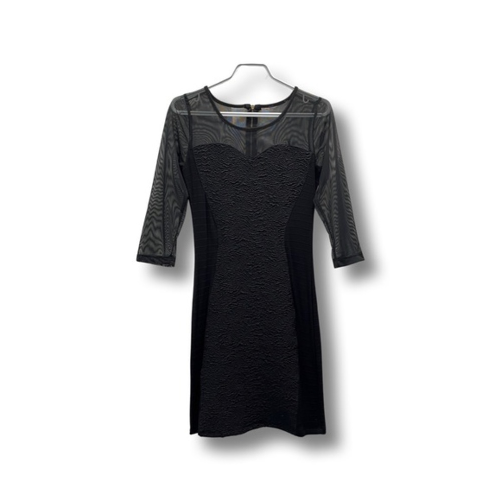LITTLE black dress with tulle arms and back